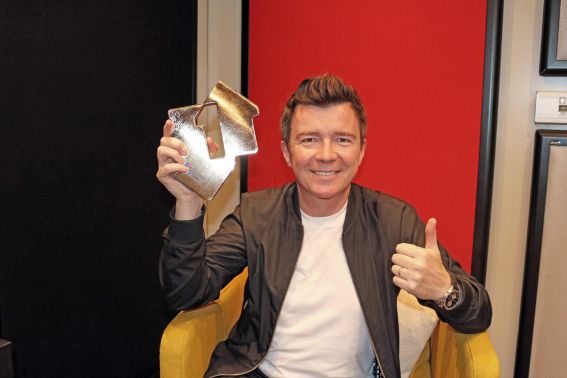 Rick Astley receives his Number One award. Picture: Official Charts Company