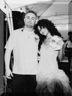 Sam Fender and Olivia Dean celebrate their record-breaking Number 1 single Rein Me In backstage at Lollapalooza, Chicago (credit: Lola Mansell) Sam Fender and Olivia Dean celebrate their record-breaking Number 1 single Rein Me In backstage at Lollapalooza, Chicago (credit: Lola Mansell)