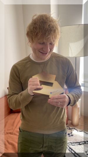 Ed Sheeran poses with his Official Number 1 Album Award for Subtract (credit: Official Charts Company)